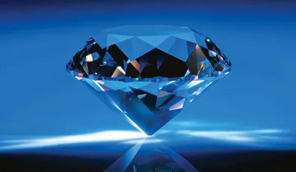 Diamant strălucitor pe un fundal albastru